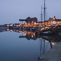 Buy canvas prints of Boats and harbour at dawn twilight. Wells-next-the by Liam Grant