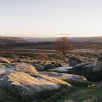 Buy canvas prints of Owler Tor rock formations at sunset. Derbyshire, U by Liam Grant
