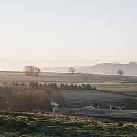Buy canvas prints of Early morning light at sunrise over a farm in Derb by Liam Grant