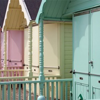Buy canvas prints of Mersea beach huts by Howard Corlett