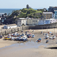 Buy canvas prints of Tenby Harbour Panorama  by Howard Corlett