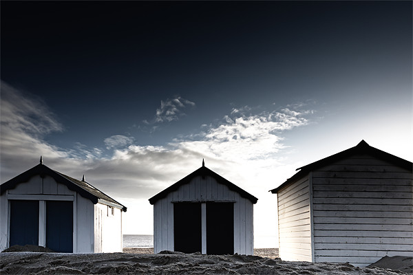 Southwold beach huts in winter Picture Board by Simon Wrigglesworth