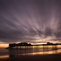 Buy canvas prints of Cromer pier before sunrise by Simon Wrigglesworth
