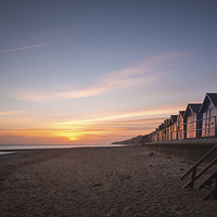 Buy canvas prints of Beach Huts at Dawn by Simon Wrigglesworth