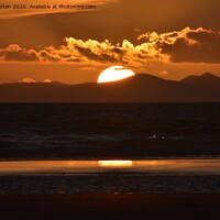 Buy canvas prints of Isle of Man Sunset  by Paul Leviston