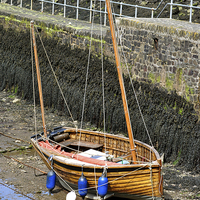 Buy canvas prints of Wooden Fishing Boat   by graham young