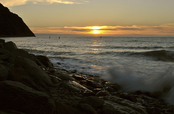 Surf and Sunset at lynmouth  Picture Board by graham young