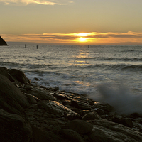 Buy canvas prints of Surf and Sunset at lynmouth  by graham young