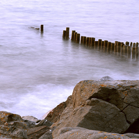 Buy canvas prints of Groyne and Rocks  by graham young