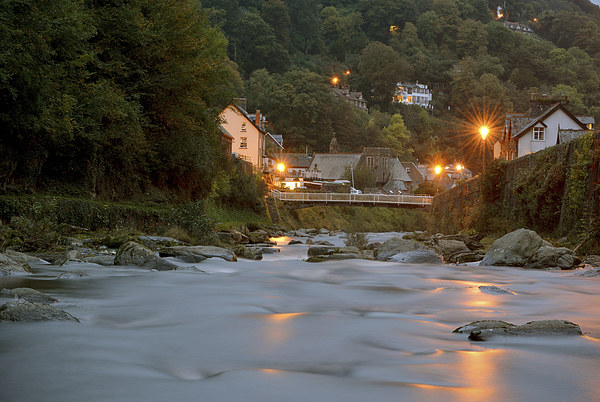 Lighting Up Time in Lynmouth  Picture Board by graham young