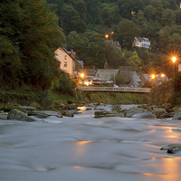 Buy canvas prints of Lighting Up Time in Lynmouth  by graham young