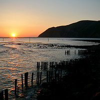 Buy canvas prints of Lynmouth Bay Sunrise by graham young