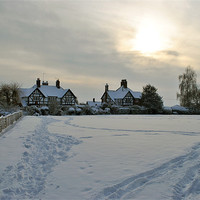 Buy canvas prints of Rothschild Houses in the Snow by graham young