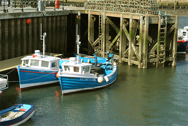 Fishing Boats in Whitby Harbour Picture Board by graham young