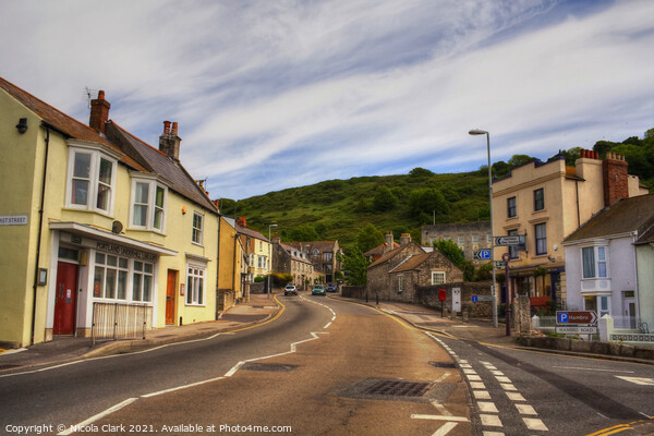 Charming Village with a Painterly Sky Picture Board by Nicola Clark