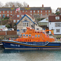 Buy canvas prints of Brave Rescuers at Weymouth Lifeboat Station by Nicola Clark