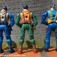 Buy canvas prints of Hilarious Action Figures Peeing by Nicola Clark
