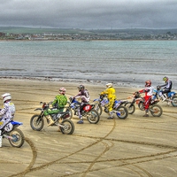 Buy canvas prints of Motocross On The Beach by Nicola Clark