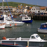 Buy canvas prints of Boats In West Bay by Nicola Clark