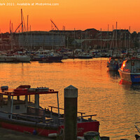 Buy canvas prints of Majestic Sunset by the Marina by Nicola Clark
