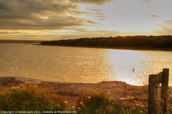 Radiant Sunset on Fleet Lagoon Picture Board by Nicola Clark
