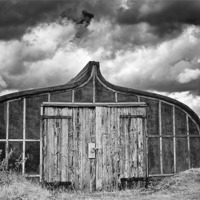 Buy canvas prints of Boat Shed, Lindisfarne, Northumberland by Dave Turner