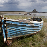 Buy canvas prints of Old Boat, Holy Island by Dave Turner