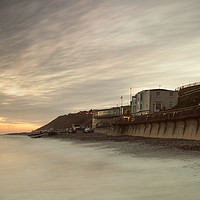 Buy canvas prints of A Cromer Sunrise by Dave Turner