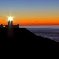 Buy canvas prints of Strumble Head Lighthouse Silhouette. Fishguard. by paulette hurley