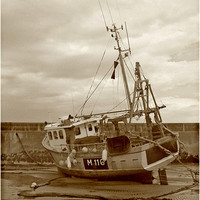 Buy canvas prints of Fishing Boat .Newquay Harbour. by paulette hurley