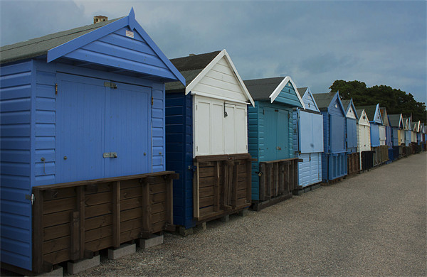 Beach Huts, Highcliffe Beach Hampshire Picture Board by Peter Elliott 