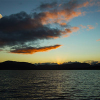 Buy canvas prints of Sunset Loch Tulla Glencoe Scotland by Peter Elliott 