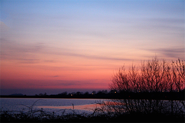 Fishmoor Reservoir at Sunset Picture Board by Peter Elliott 