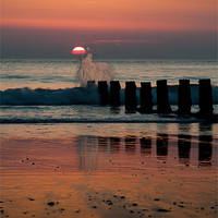 Buy canvas prints of Beach sunset with splash by Izzy Standbridge