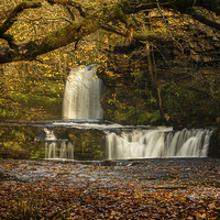 Buy canvas prints of  Autumn waterfall by Izzy Standbridge