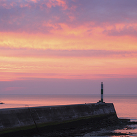 Buy canvas prints of  Sunset over Aberystwyth stone pier by Izzy Standbridge