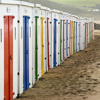 Buy canvas prints of Woolacombe beach huts north Devon by Tony Bates