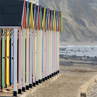 Buy canvas prints of Swanage beach huts by Tony Bates