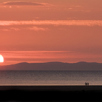 Buy canvas prints of Sunset on Barmouth beach by Tony Bates
