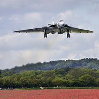 Buy canvas prints of Avro Vulcan XH558 landing at Abingdon by Tony Bates