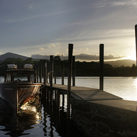 Buy canvas prints of Derwentwater sunset by Tony Bates