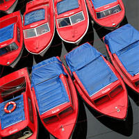 Buy canvas prints of Red Boats by Tony Bates