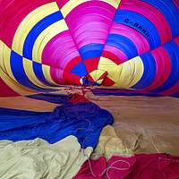 Buy canvas prints of Hot air balloon inflation by Tony Bates