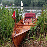 Buy canvas prints of Wooden rowing boat by Tony Bates