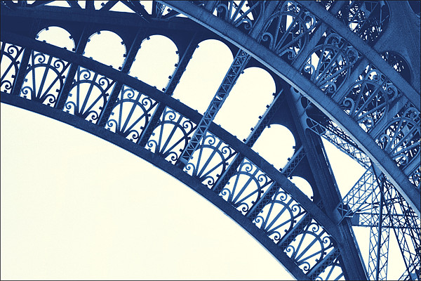 Eiffel Tower in Blue Picture Board by Lucy Antony