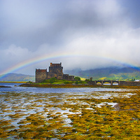 Buy canvas prints of Rainbow over Eilean Donan Castle by Chris Thaxter
