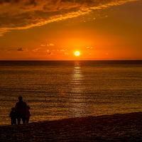 Buy canvas prints of  Watching the Sunset 2 by Chris Thaxter