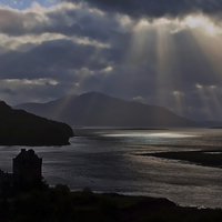 Buy canvas prints of Eilean Donan Castle Sun Rays by Bel Menpes