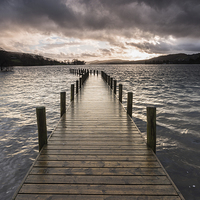 Buy canvas prints of Coniston Water Stormy Sunset by James Grant
