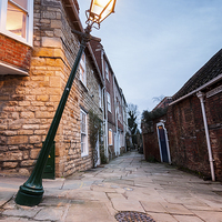 Buy canvas prints of  Lincoln Leaning Lampost by James Grant